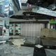 Broken glass and panels litter the floor at New Chitose Airport.